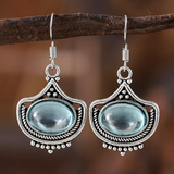 Collier rétro et boucles d'oreilles avec des pierres précieuses ovales bleues | Or