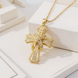 Pendentif croix rayonnante | Or